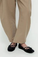 Black Christin Wu Annaya flats with pointed toes and sleek design, perfect for casual or formal wear.