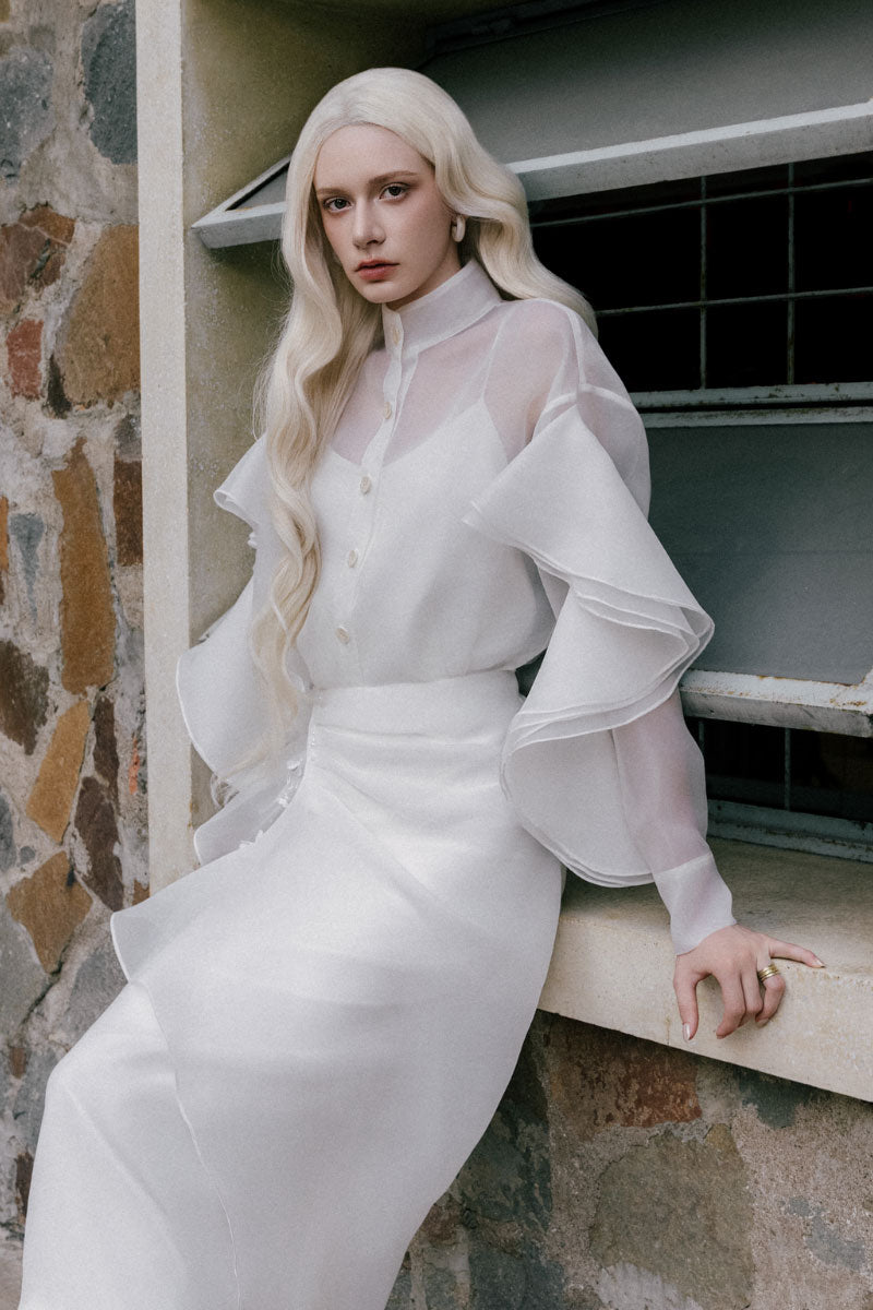 White Plan Lindsay shirt and bone skirt co-ords set, featuring a stylish white shirt paired with a matching bone-colored skirt.