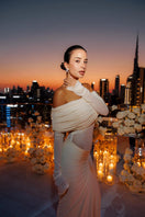 Deme By Gabriella Jolene off-shoulder ruched gown in elegant fabric, featuring a fitted bodice and flowing skirt.