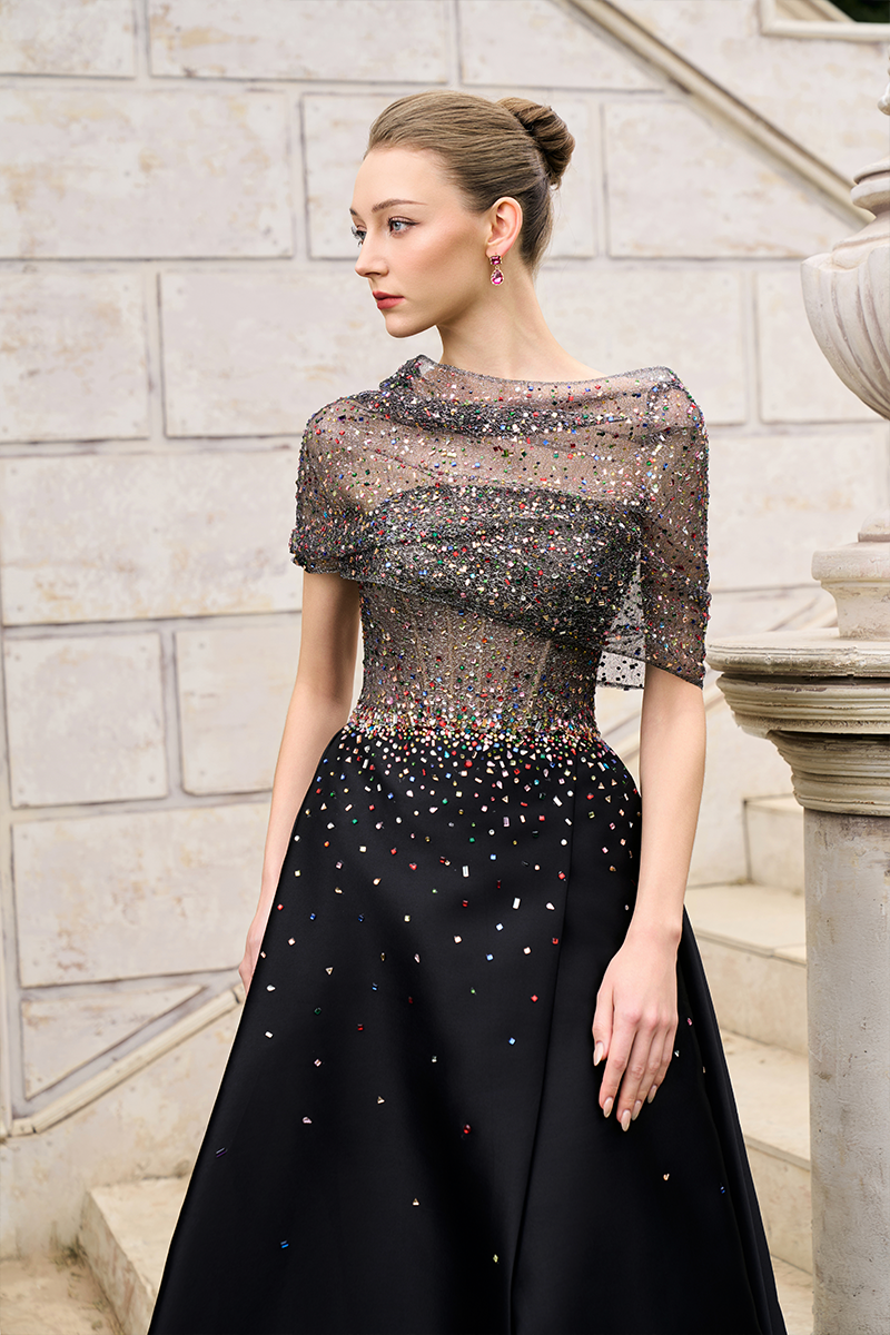 Elegant Tracy Studio crystal lace and bamboo taffeta gown with intricate lace details and flowing fabric.