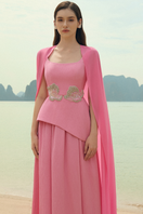 Lune De Soie ruched silk gown with elegant draping and a flowing silhouette, showcased in a luxurious fabric.