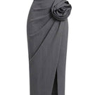 Keira Tong twisted floral midi skirt with a vibrant floral pattern and flowing fabric, showcased in the image.