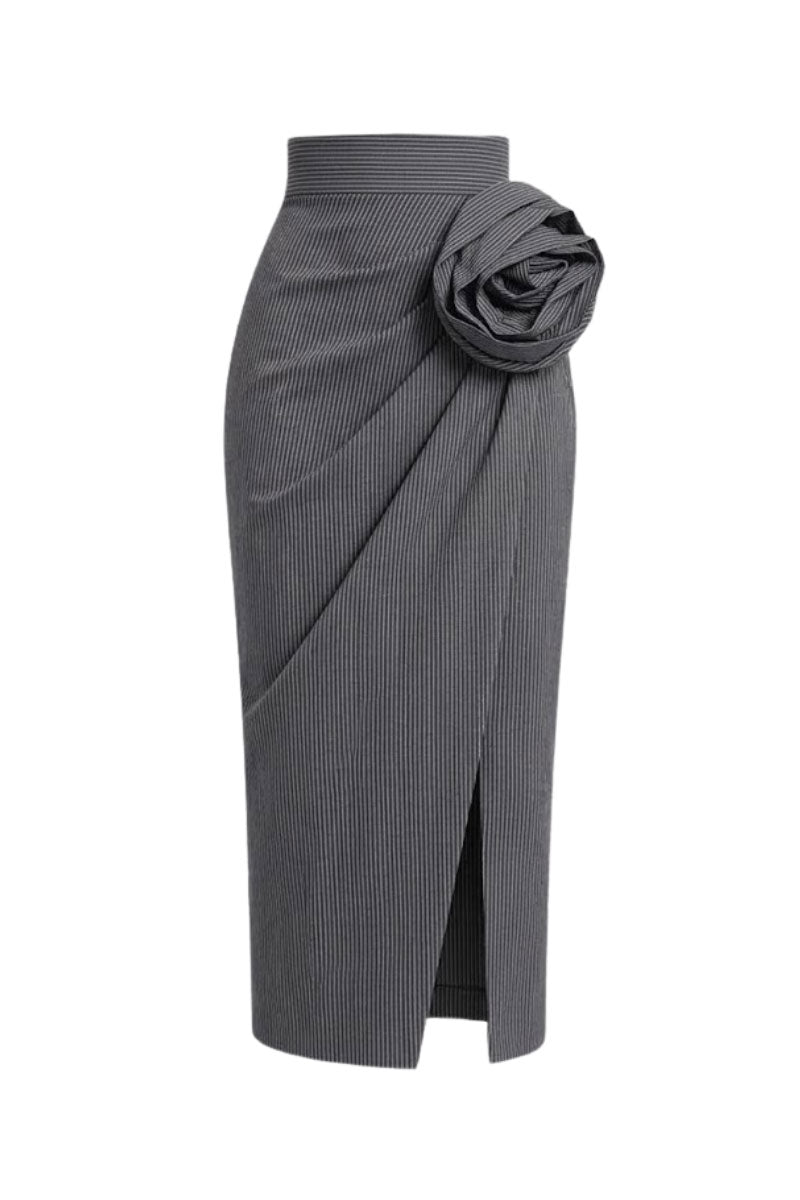 Keira Tong twisted floral midi skirt with a vibrant floral pattern and flowing fabric, showcased in the image.