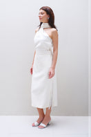 Aidan & Ice Amira midi skirt in cream, showcasing its flowy fabric and elegant length, perfect for sophisticated style.