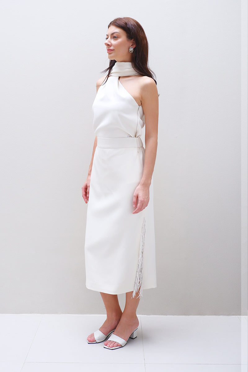 Aidan & Ice Amira midi skirt in cream, showcasing its flowy fabric and elegant length, perfect for sophisticated style.