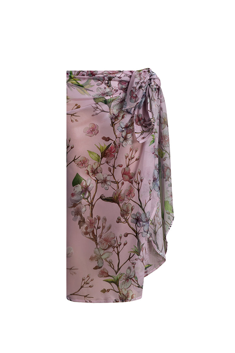 Nur Karaata Monaco Mist Pareo cover-up shown draped, lightweight fabric with tropical print, perfect for beach or poolside wear.