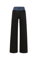 TT Studios AVA jeans in Doyers Street style, showcasing classic denim fabric and slim fit design with visible stitching and pockets.