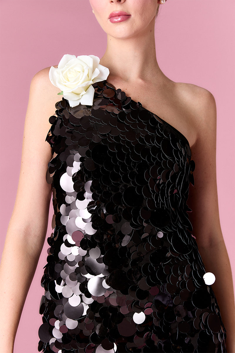Nur Karaata Giselle Minimax Dress gown with intricate detailing and flowing fabric, shown in a stylish evening wear design.