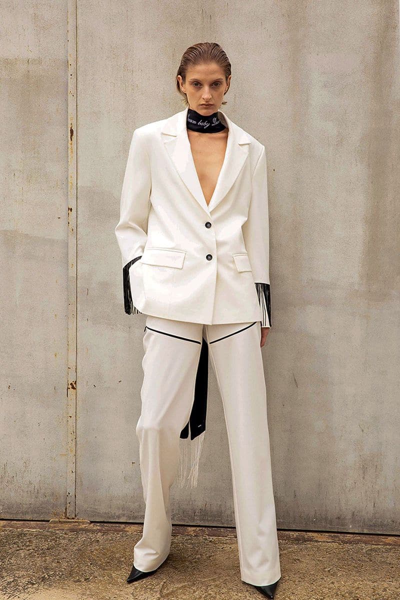 Vaska white blazer with beaded fringe detailing, tailored fit, and stylish design, perfect for a chic modern look.