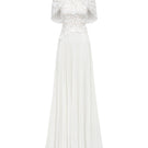 Elegant grain weave gown by Tracy Studio featuring intricate fabric texture and flowing silhouette.