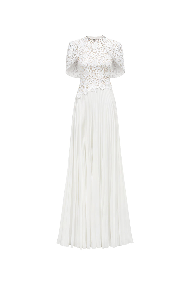 Elegant grain weave gown by Tracy Studio featuring intricate fabric texture and flowing silhouette.