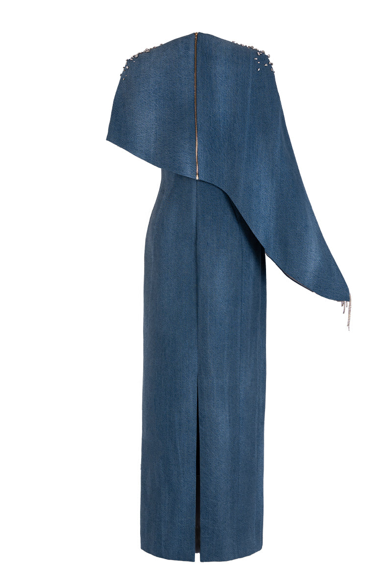 Blue asymmetrical maxi dress with draped cape sleeve by GVLUX, featuring elegant flowing fabric and modern design.