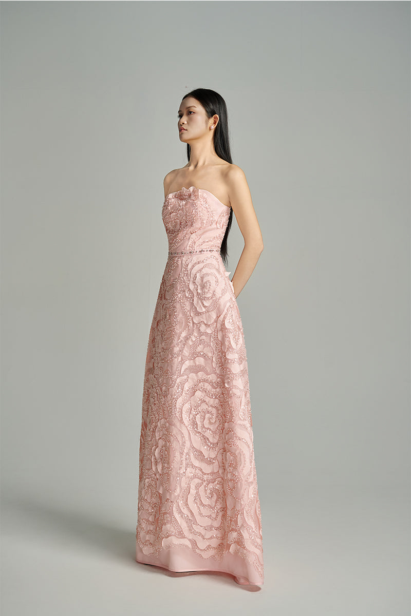 Pink CULT MIA X HAPPY CLOTHING flower wave A-line gown with matching scarf, featuring floral patterns and a flowing silhouette.