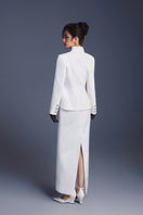 White zipper peplum top by Keira Tong featuring a fitted design and stylish peplum detail, perfect for casual or chic outfits.
