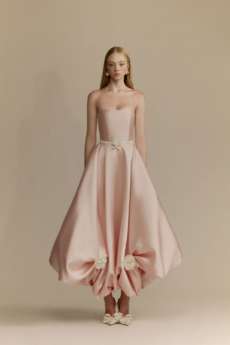 White Plan Gardenia Gown with flowy fabric and floral details, elegant evening gown for formal occasions.