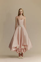 White Plan Gardenia Gown with flowy fabric and floral details, elegant evening gown for formal occasions.