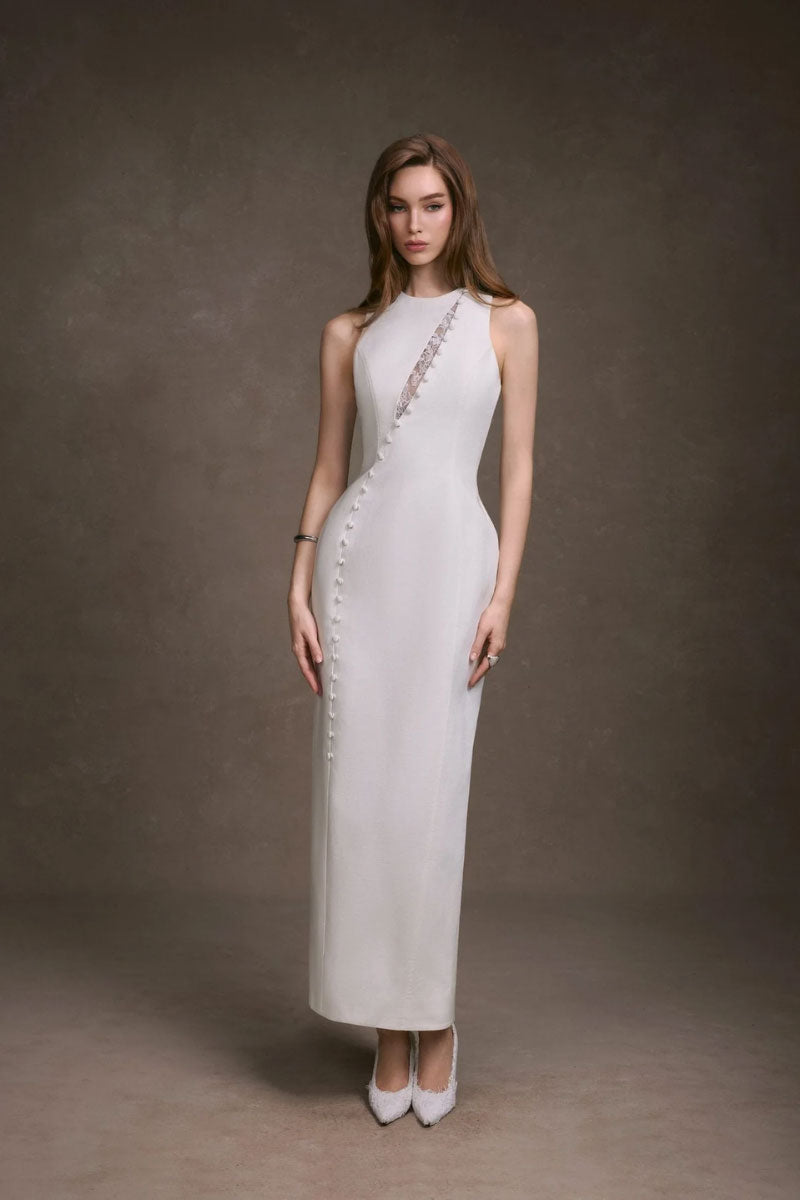 Keira Tong lace peek maxi dress, featuring intricate lace details and a flowing silhouette, perfect for elegant occasions.