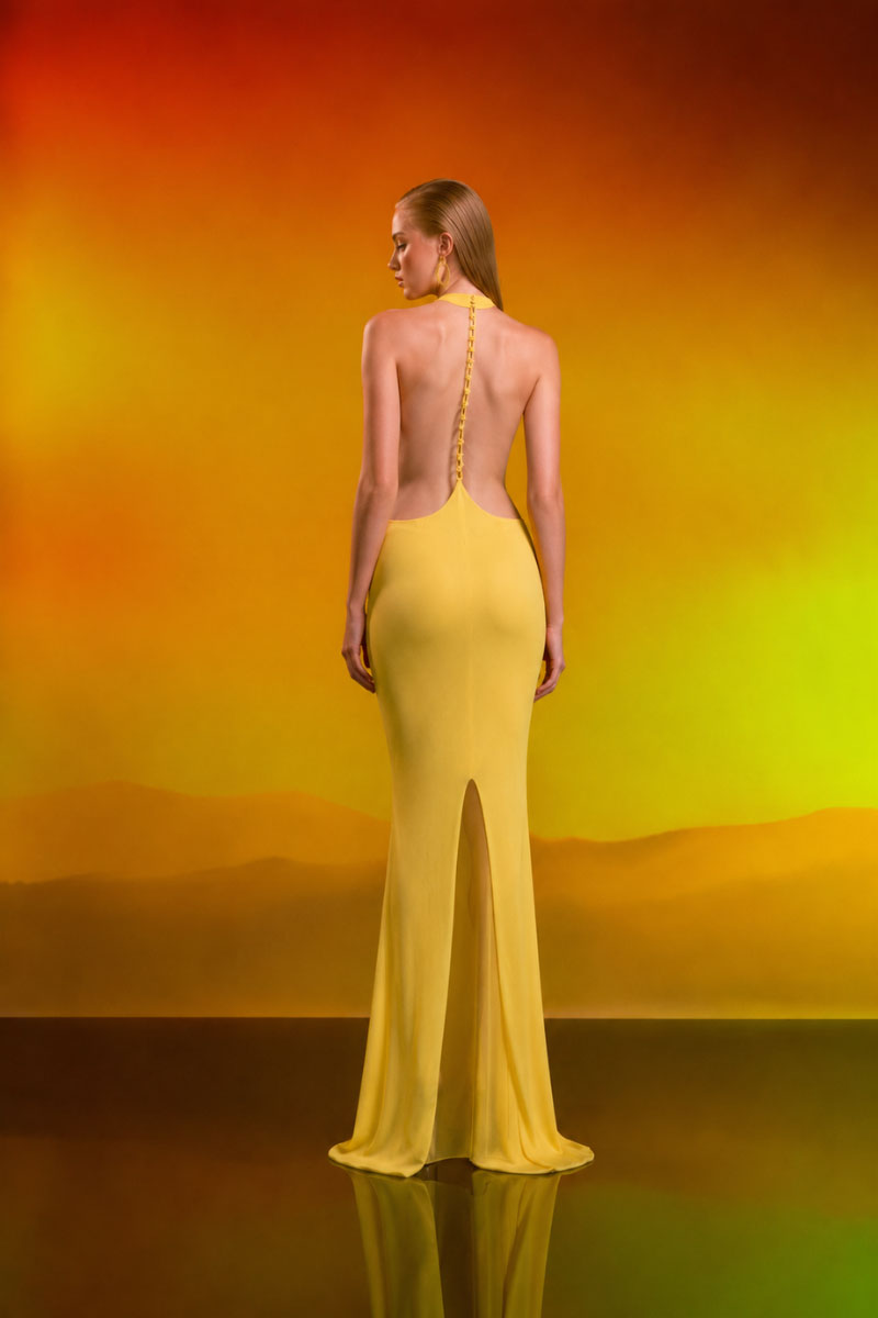 CEM Crystal Knit Gown featuring a shimmering knit fabric and elegant design, perfect for formal or special occasions.