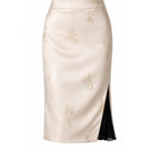 Ivory flowered midi pencil skirt by LeCIA, showcasing a fitted design with a floral print and sleek silhouette.