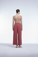 Dāl the Label relaxed wide-leg cropped pants in soft fabric, featuring a loose fit and cropped length for casual comfort.