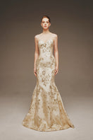 Elegant Aurelía floral mermaid gown by Margée Atelier with intricate floral embroidery and flowing fabric.
