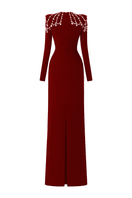 Tracy Studio SR red long sleeve bodycon maxi dress with trapezoid neckline, full-length design, on a model.