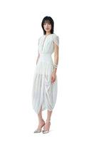 Light pastel pale whisper midi dress by Do Long, featuring a flowy silhouette and elegant fabric, perfect for stylish occasions.