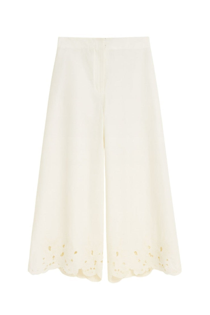 Rebecca Taylor Rachelle ivory pants laid flat, showing slim fit design and smooth fabric with subtle stitching details.