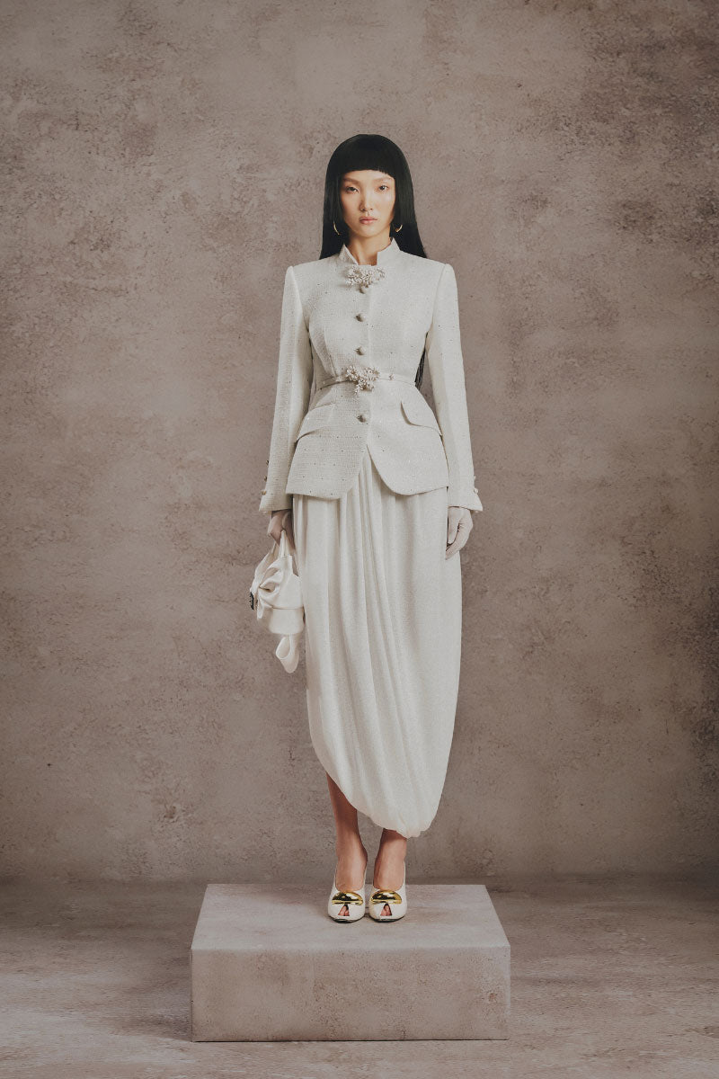Ivory sculpted co-ords set from White Plan featuring fitted top and matching high-waisted pants in a textured fabric.
