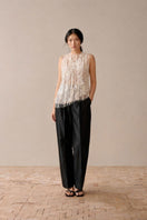 White Levia embroidered see-through top with intricate embroidery and lightweight, sheer fabric, perfect for stylish layered looks.