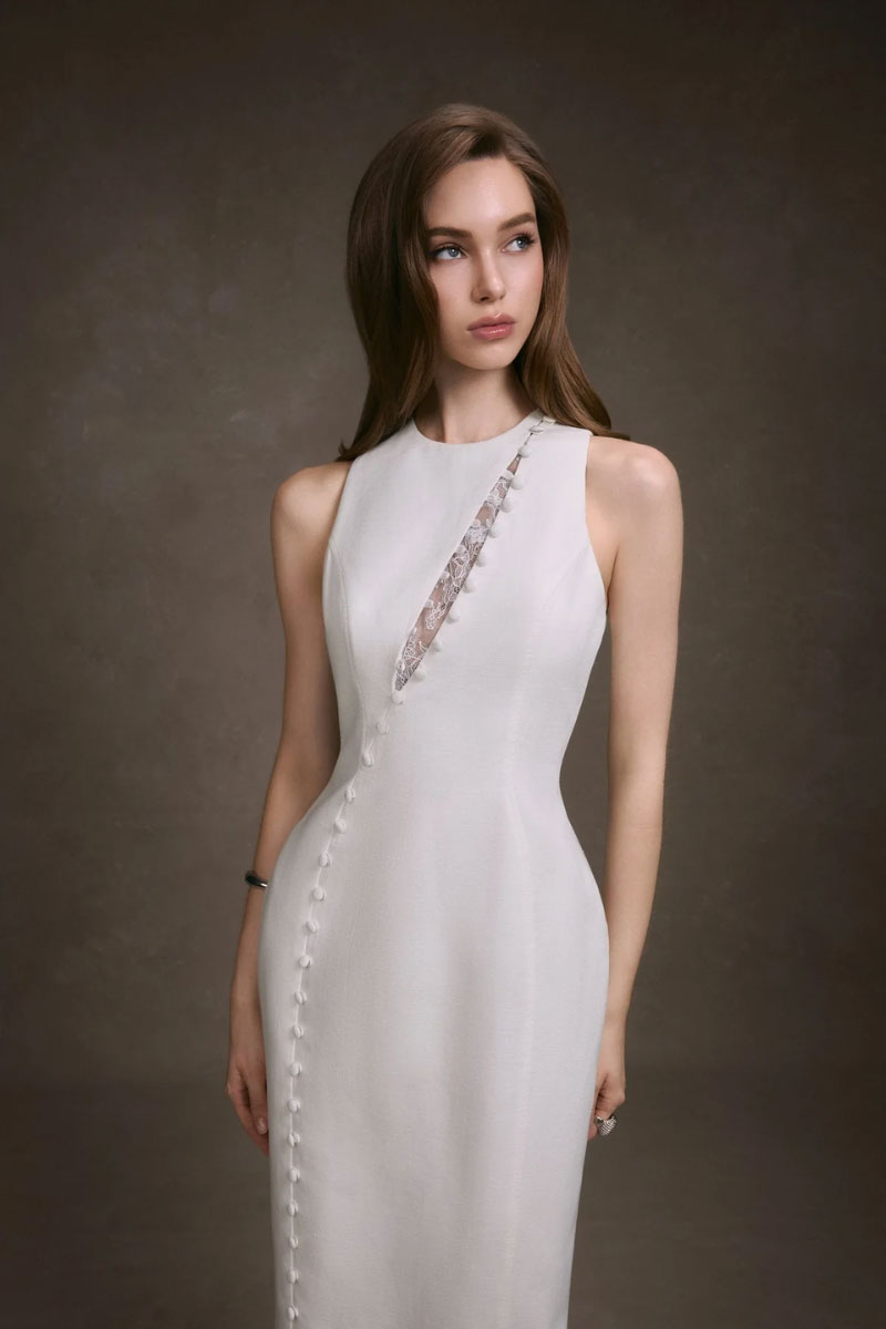 Elegant lace peek maxi dress by KEIRA TONG featuring intricate lace details and a flowing silhouette.