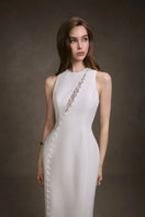 Keira Tong lace peek maxi dress featuring intricate lace details and a flowing silhouette, perfect for elegant occasions.