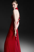 Red Zafielle halter floor-length gown by Maison Des Copains, featuring elegant design and flowing fabric.