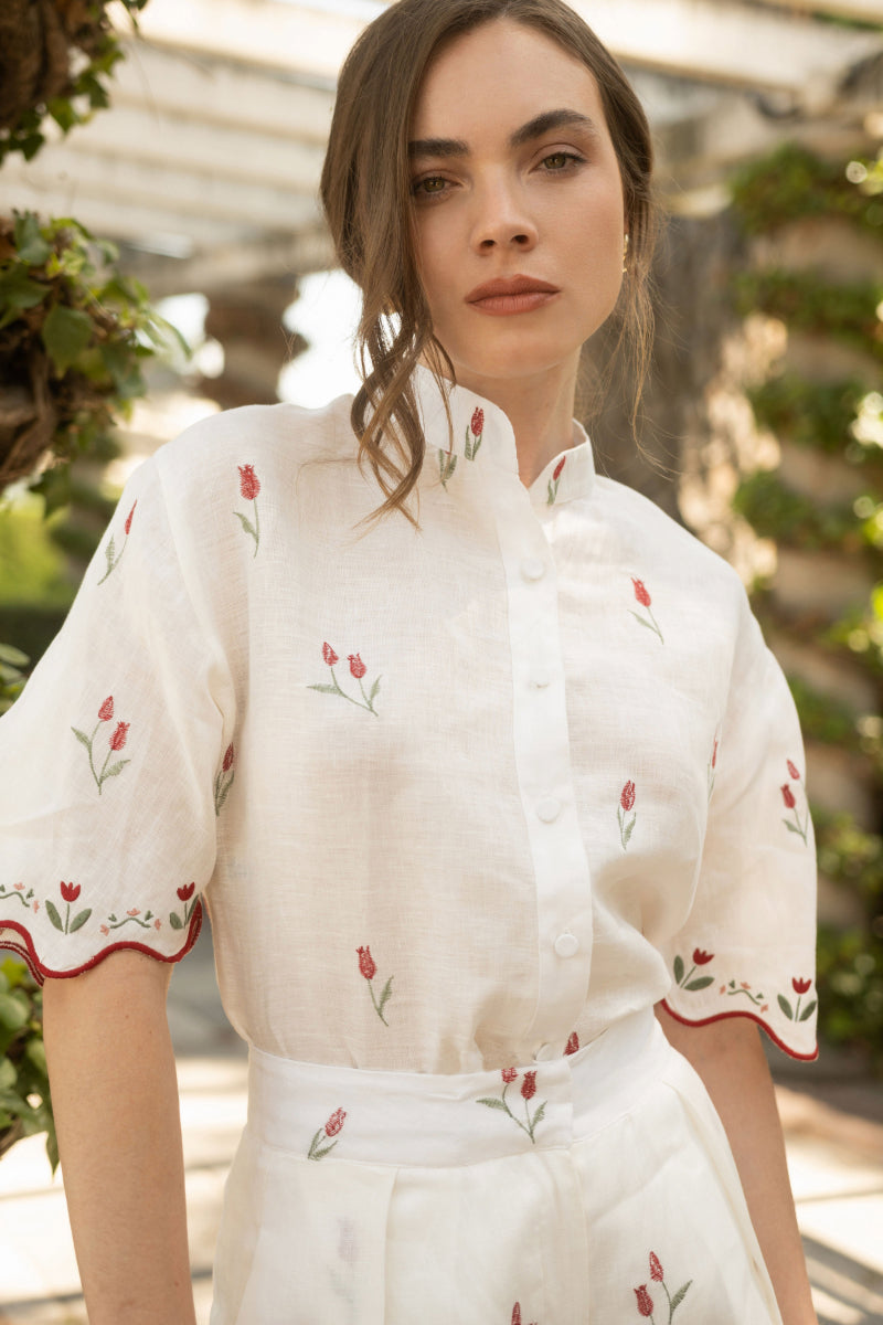 Estefania ivory tulip shorts with a relaxed fit, featuring a soft fabric and casual style perfect for warm weather.