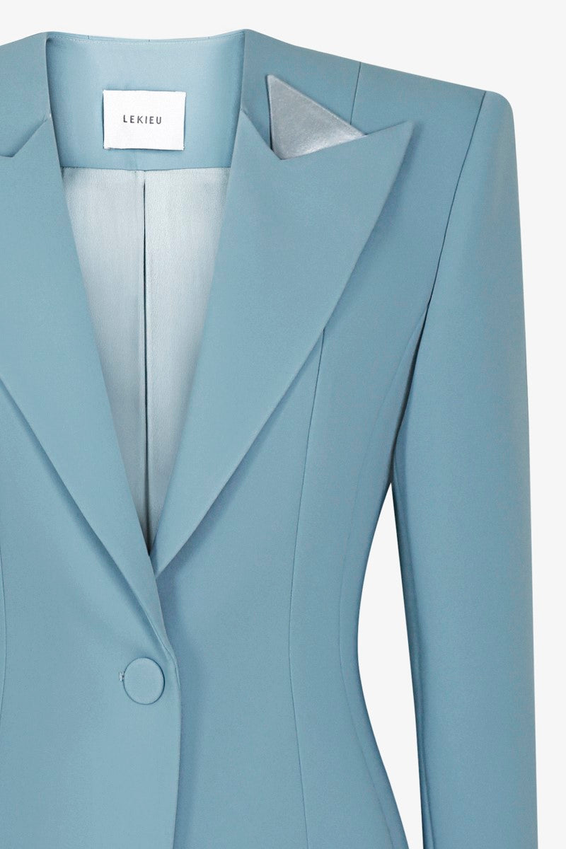 Light blue Grosvenor baby blazer by Lekieu, tailored for stylish infants with a classic collar and button closure.