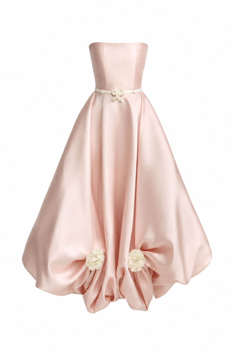 White Plan Gardenia dress gown with floral design and flowing fabric, ideal for elegant occasions.
