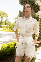 Estefania ivory tulip-print shorts with a relaxed fit, featuring a comfortable waistband and floral pattern.