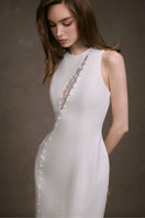 Keira Tong lace peek maxi dress featuring intricate lace detail and a flowing silhouette in a stylish mini dress design.
