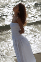 Summer Away Provence Dress in Ice Blue, a flowing maxi dress with elegant design and lightweight fabric, perfect for warm weather.