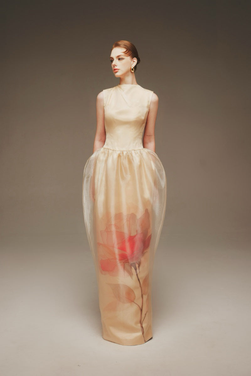 Elegant Margée Atelier Ethereal Rose Sculptural Maxi Dress with flowing fabric and intricate draping, displayed on a mannequin.