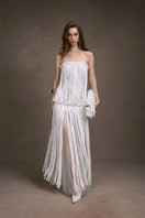 Keira Tong fringe lace maxi dress featuring a fitted corset bodice and flowing skirt with intricate lace details.