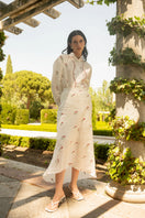 Estefania ivory tulip long sleeve shirt with a relaxed fit and subtle floral design, perfect for casual or office wear.