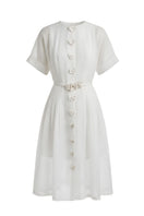 White Plan Alina Sheer Midi Dress displayed on a model, featuring lightweight, flowing fabric and elegant design.