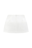 White Ontario mini skirt by Arti Apparel, stylish and fitted, shown on a model with a clean, modern background.