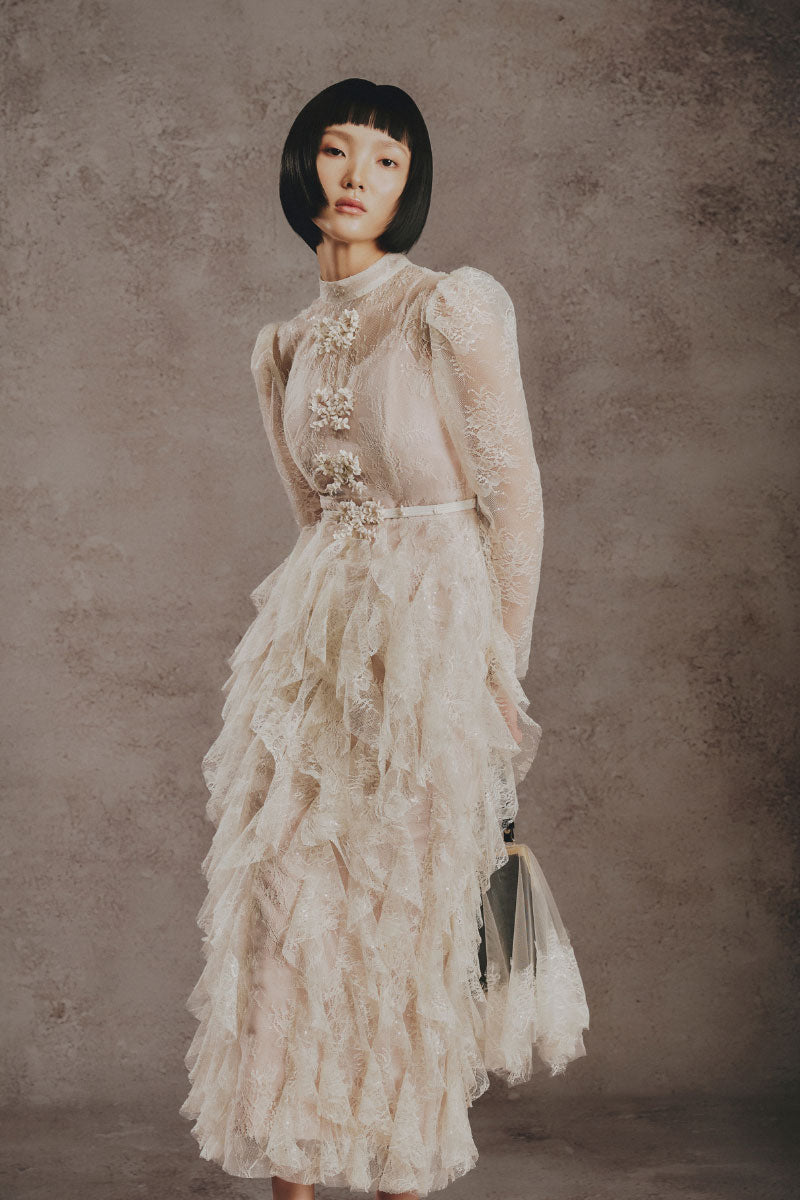 White Plan blush feather romance midi dress with delicate feather details and flowing fabric, perfect for elegant occasions.