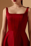 Liliana red taffeta U-line midi dress by 21Six, showing smooth fabric and elegant design with a fitted waist and knee-length hem.