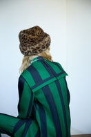 Green striped blazer by ColoReve, tailored fit with notch lapels and stylish pattern, displayed on a hanger.