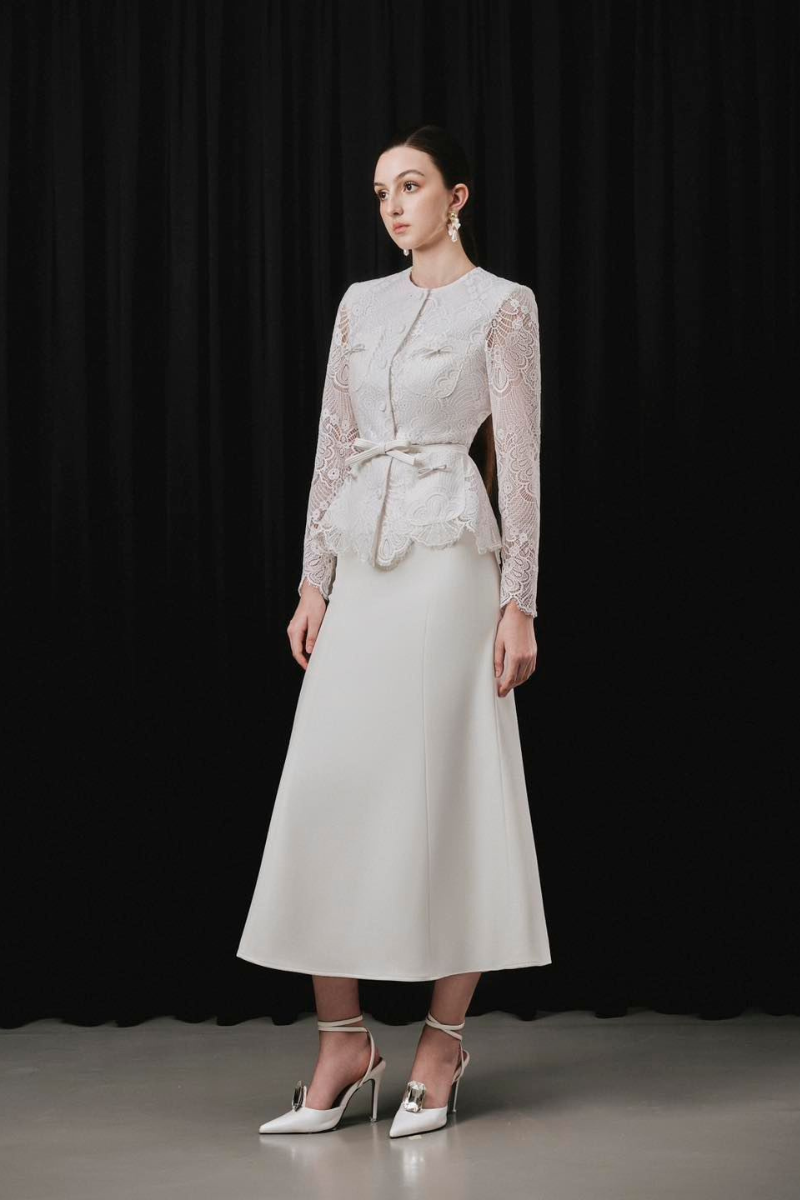 White Plan Soven Top and Noven Skirt co-ord set, featuring stylish matching top and skirt in a coordinated design.