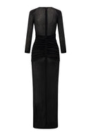 Black Caprila maxi dress by Arti Apparel featuring a flowing silhouette and elegant design, shown on a model.