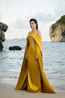 Tracy Studio curved draped off-shoulder gown with long sleeve cape, elegant evening dress with flowing fabric and stylish design.
